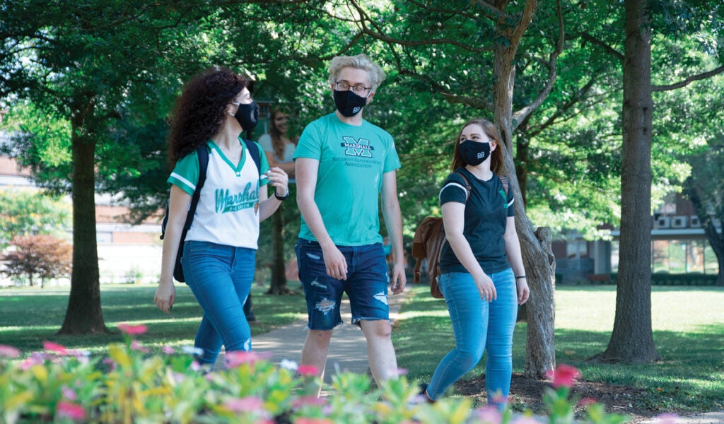 Students with masks on Huntington campus