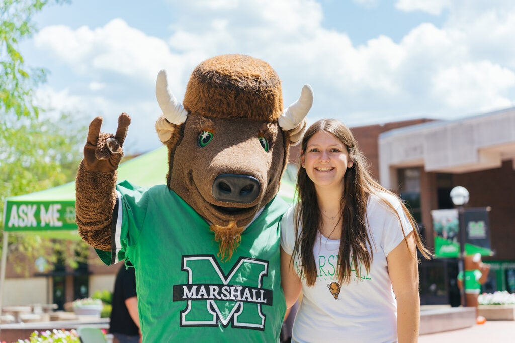 Olivia Southall smiles with Marco on the Memorial Student Center Plaza