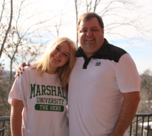 Haley Prather and her father, both wearing Marshall University shirts