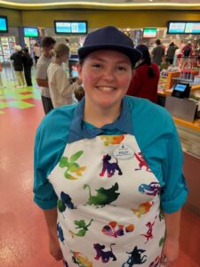 Kelci Armstead wears her Disney uniform while standing in Art of Animation Resort at Walt Disney World
