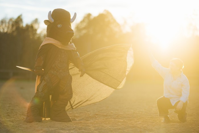 Image shows Marco being staged in the Dune costume at sunset