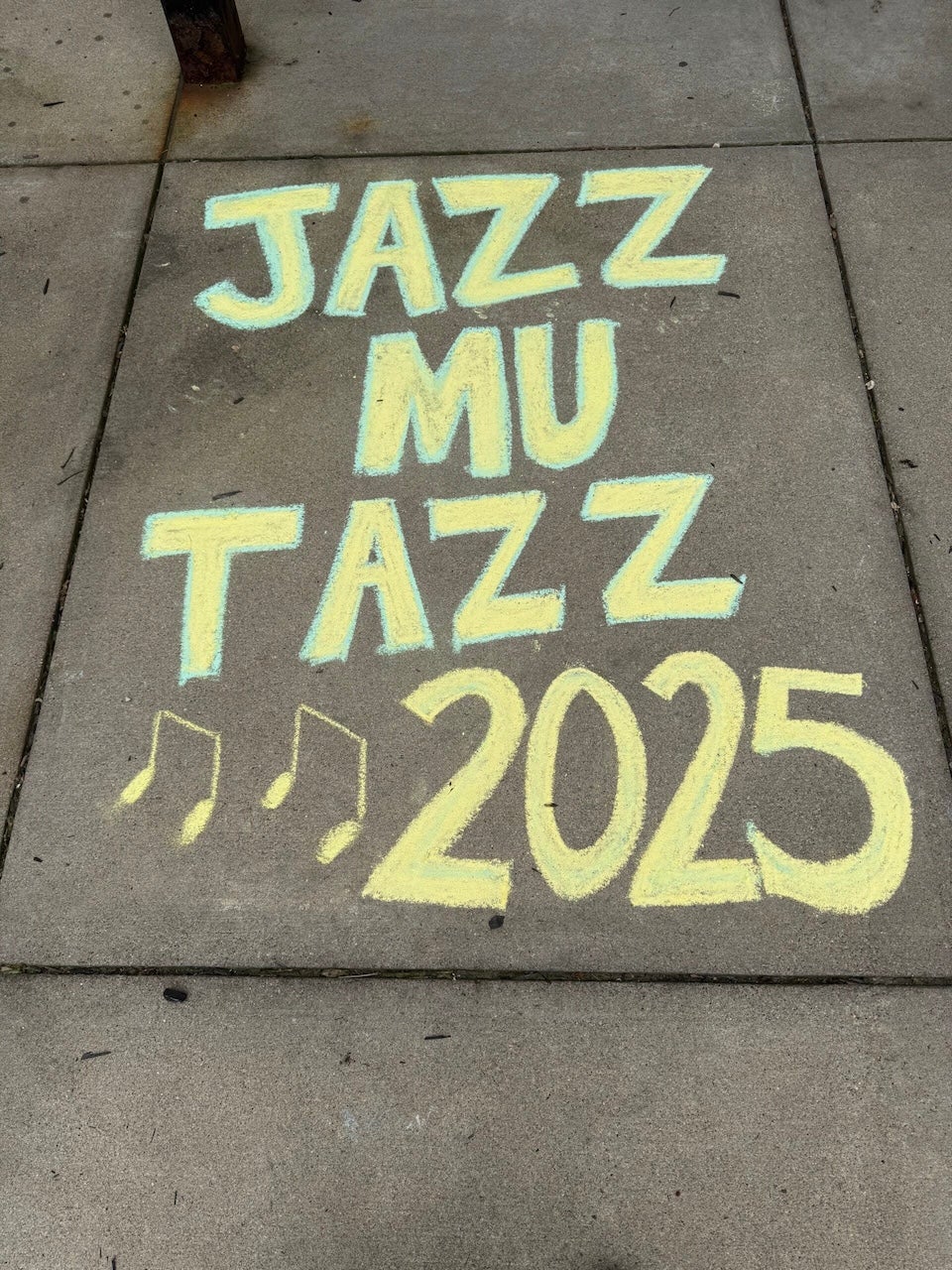 Image of Jazz-MU-Tazz written on sidewalk