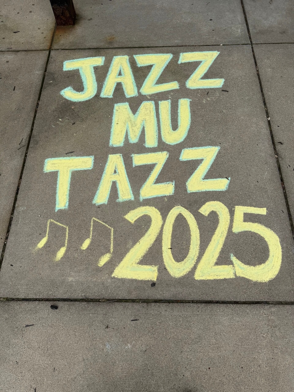 Image of Jazz-MU-Tazz written on sidewalk