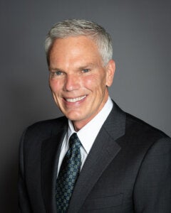 Headshot photograph of Marshall University President Brad D. Smith