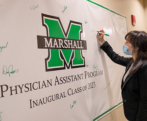 Paulome Srivastava signing PA class banner