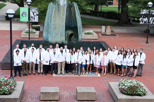 First-year pharmacy students receive white coats, scholarship awards -  Marshall University News