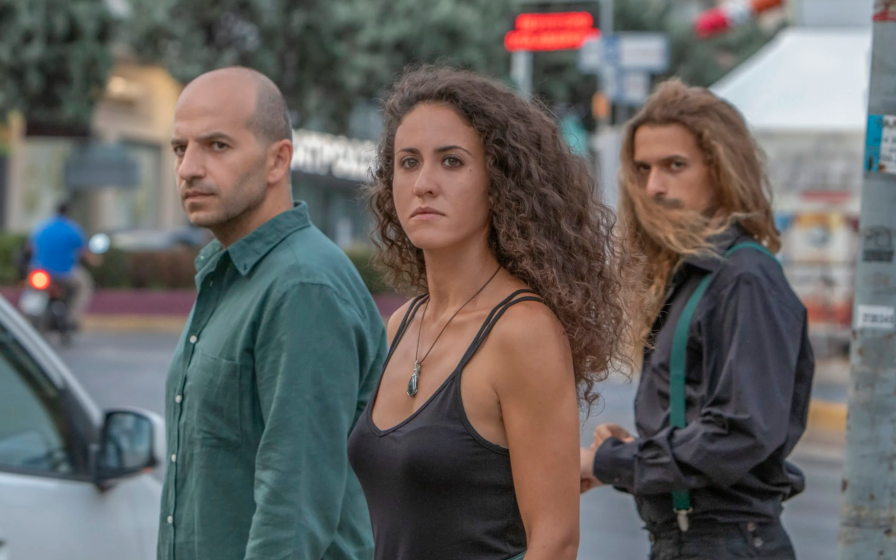 Three people in a line