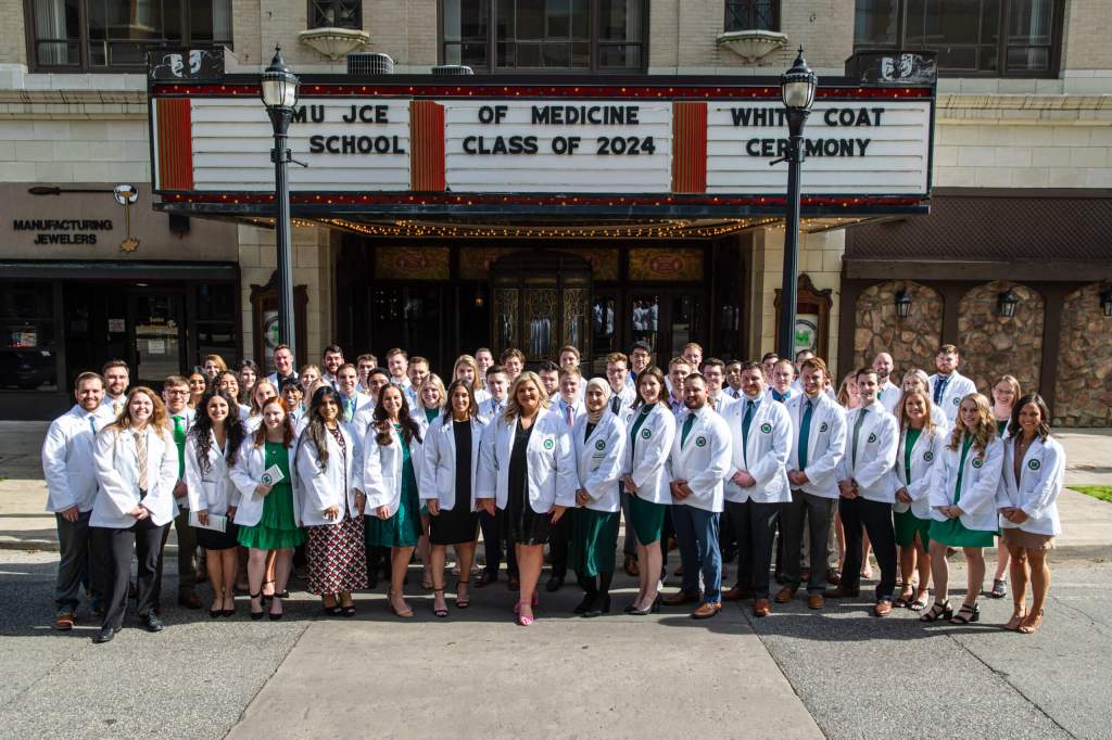 group of students in white coats