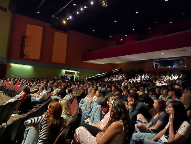 Students at Point Pleasant High School listen as officials explain the Marshall Direct Admit Program