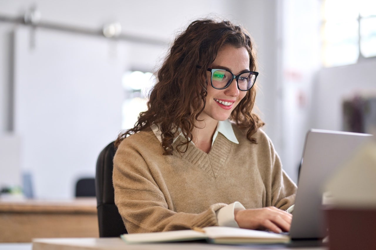 Image of female student on computer