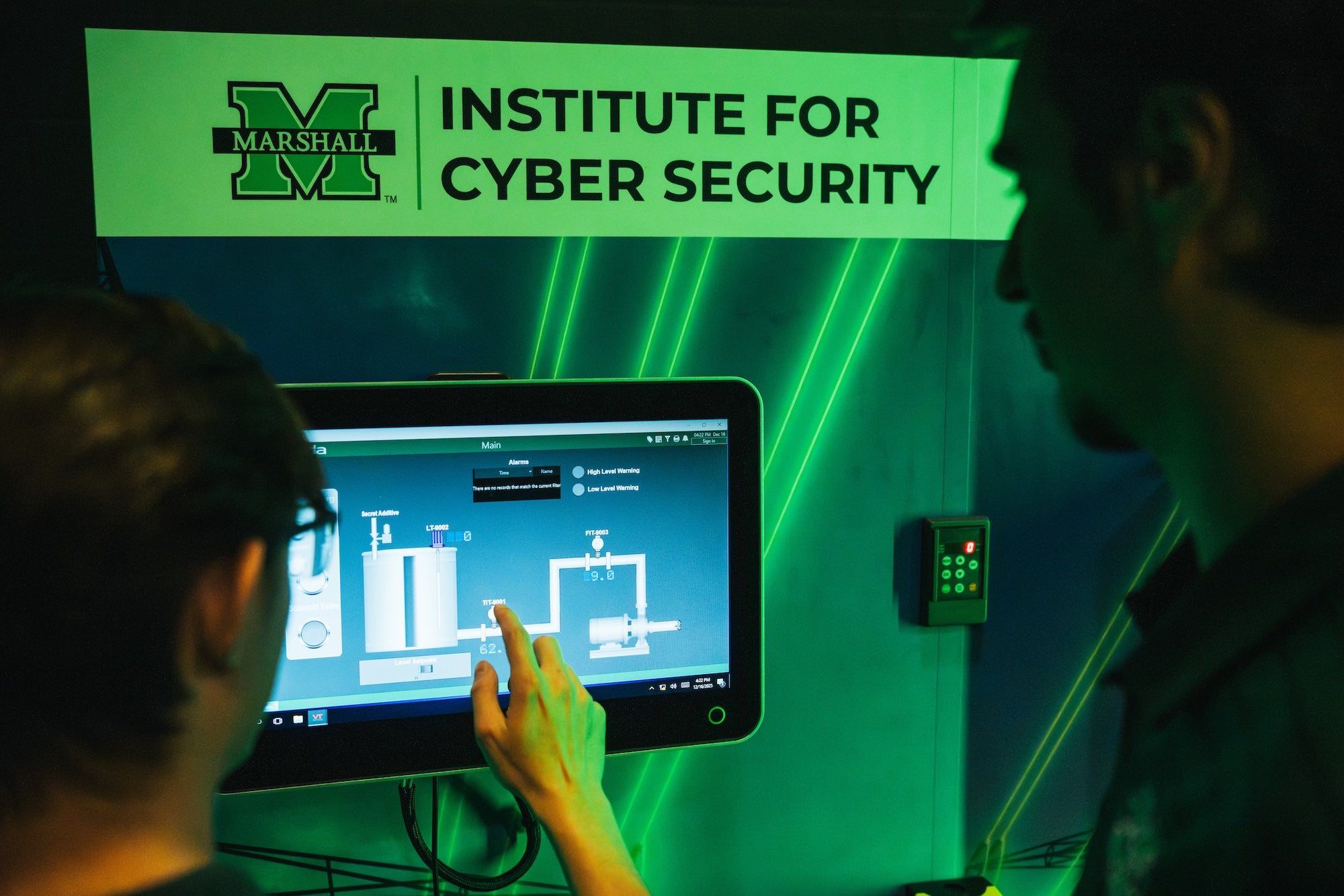 Institute for Cybersecurty and person at a computer