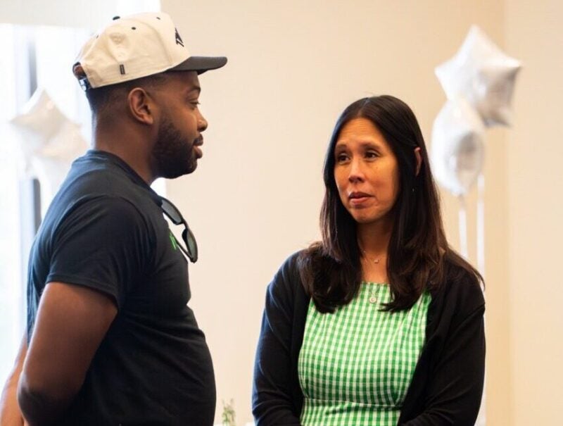Two people talking