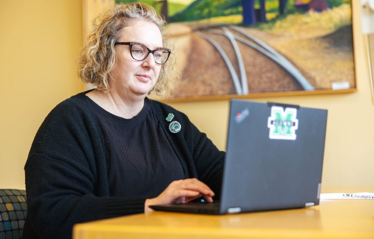 student working on a laptop