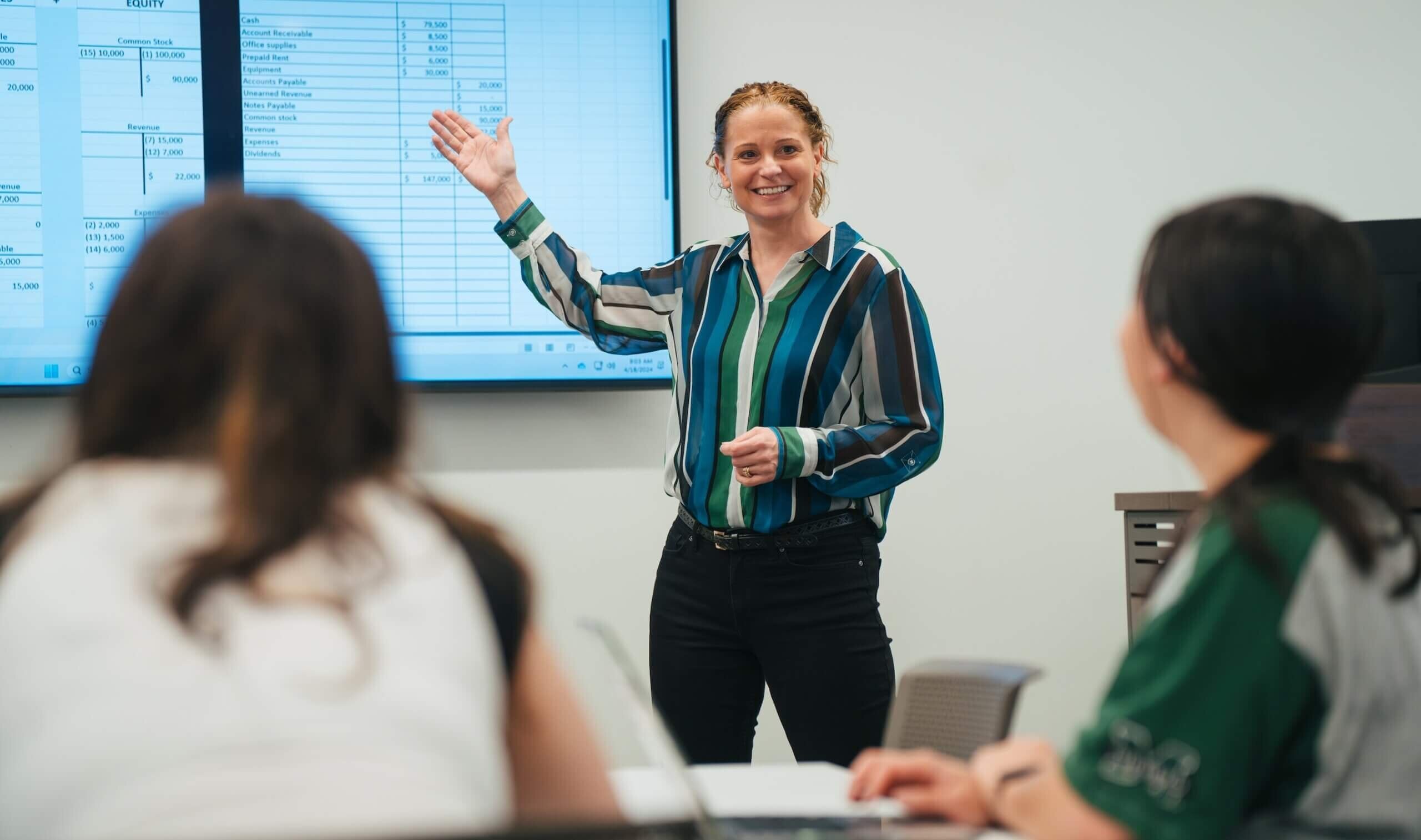 Professor teaching a small class