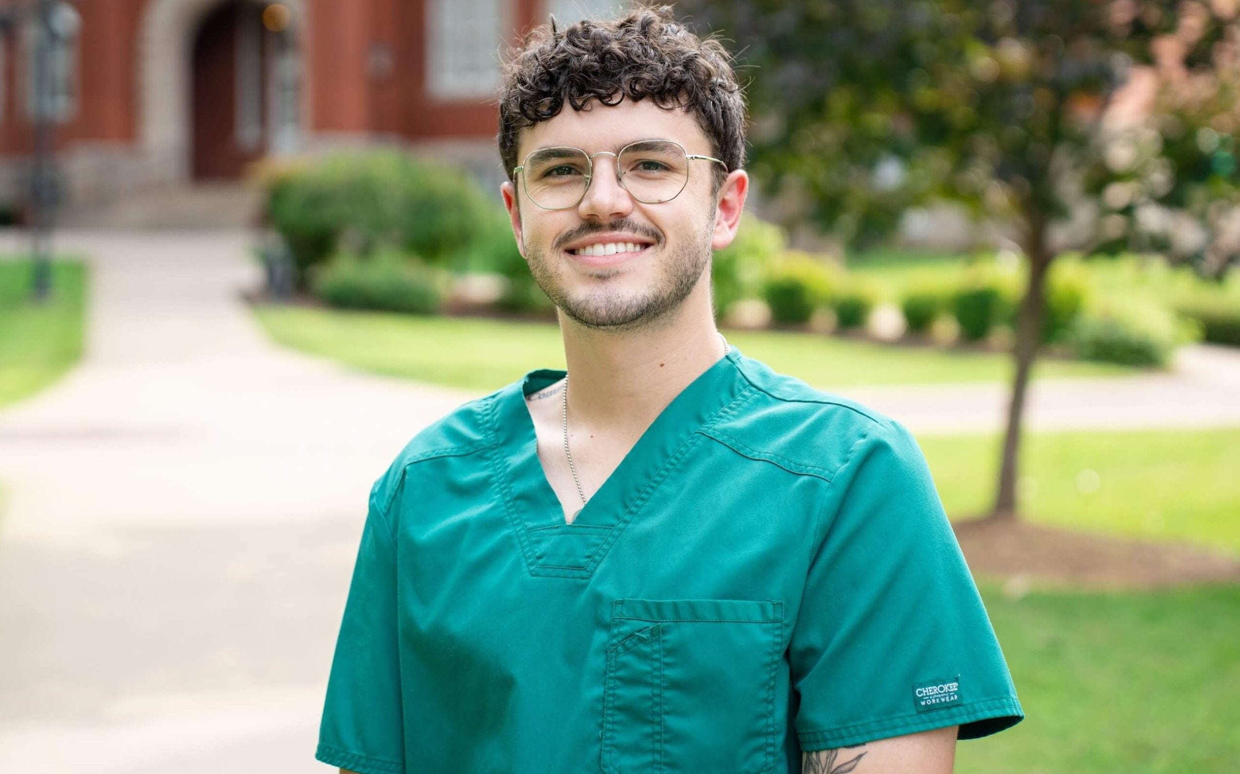 nursing student standing outside Old Main