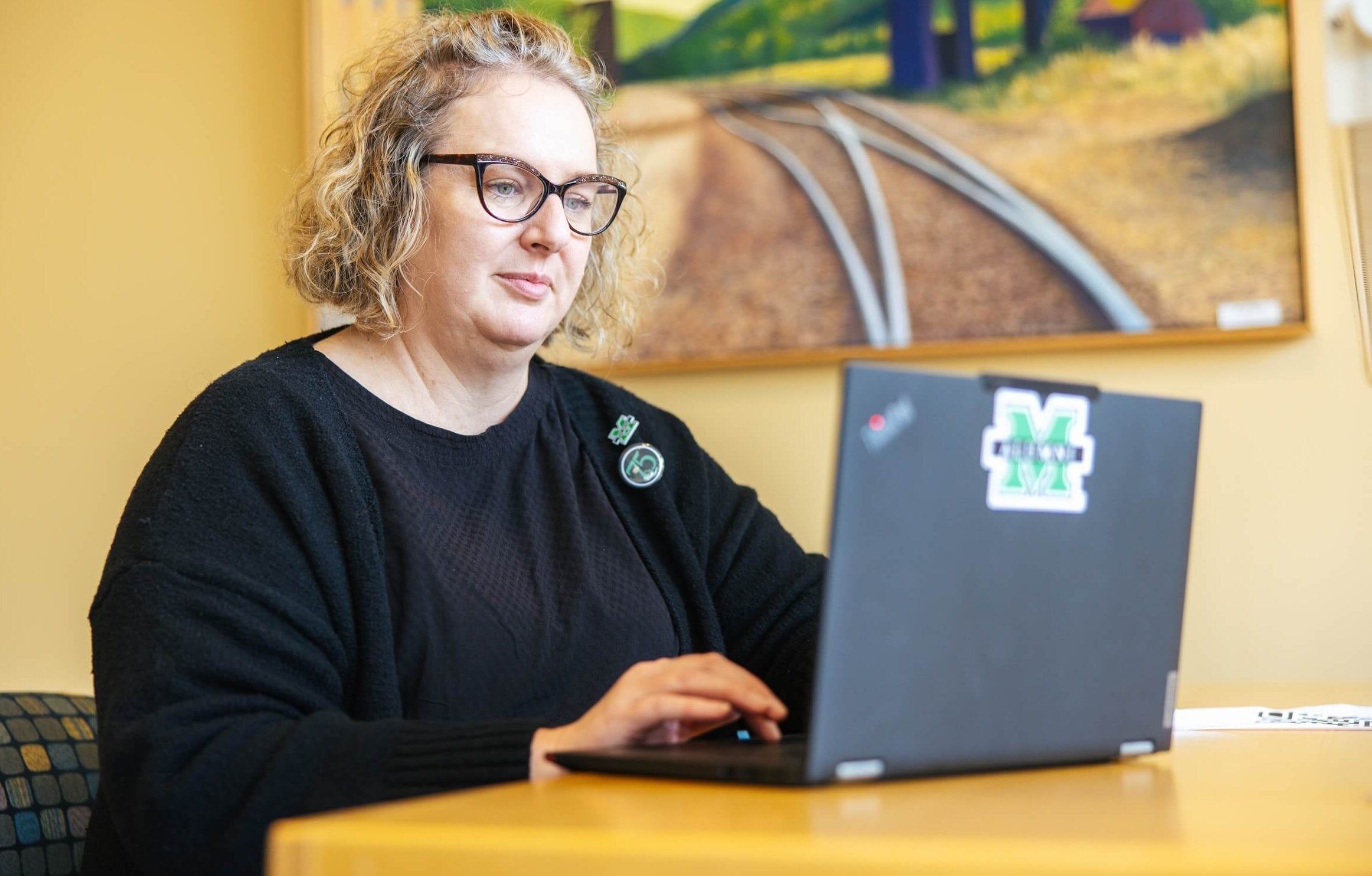 student working on a laptop