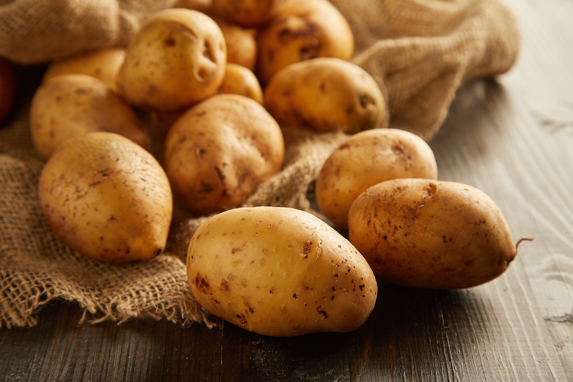 potatoes on a wooden table