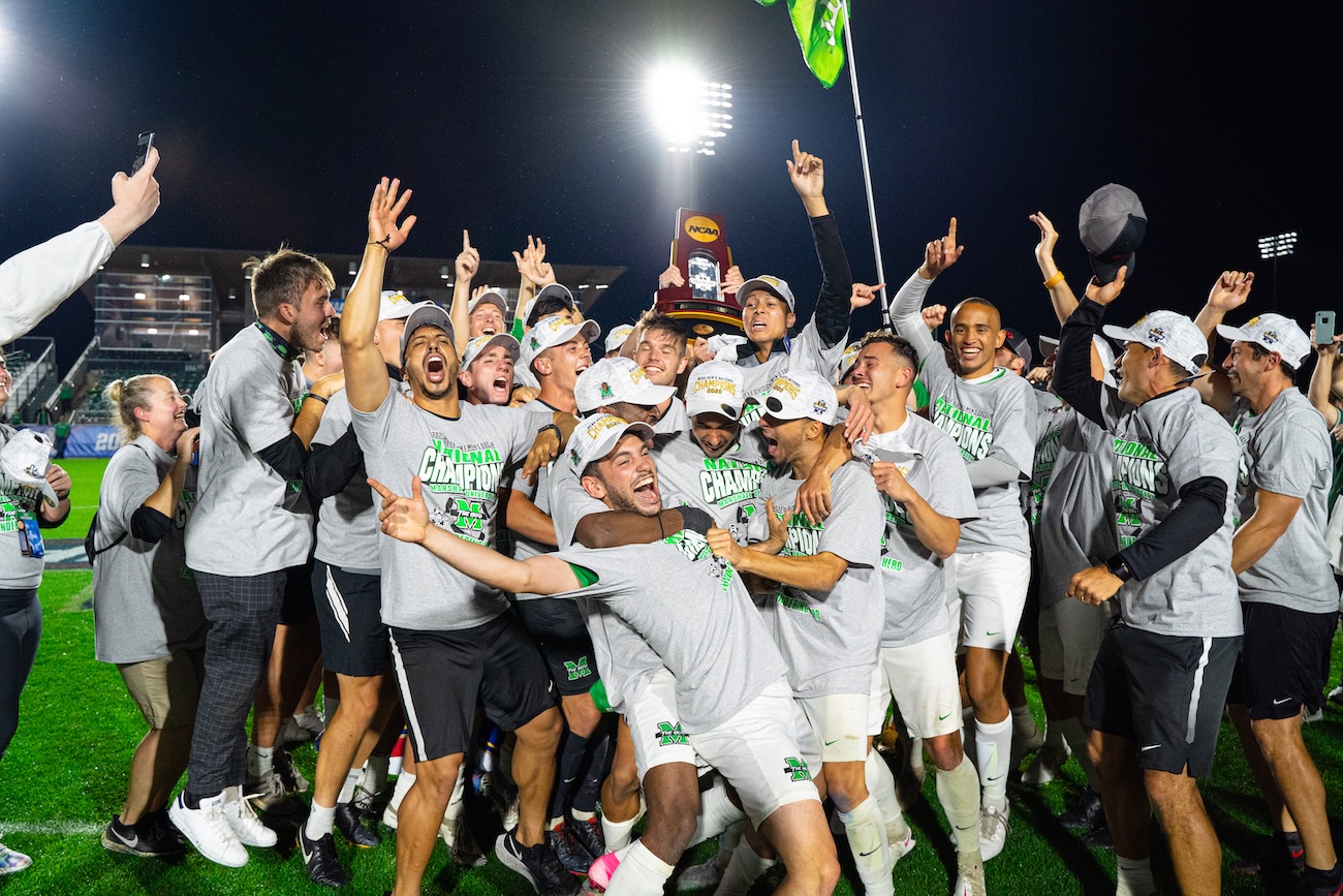 Men's Soccer team celebrating after winning the national championship