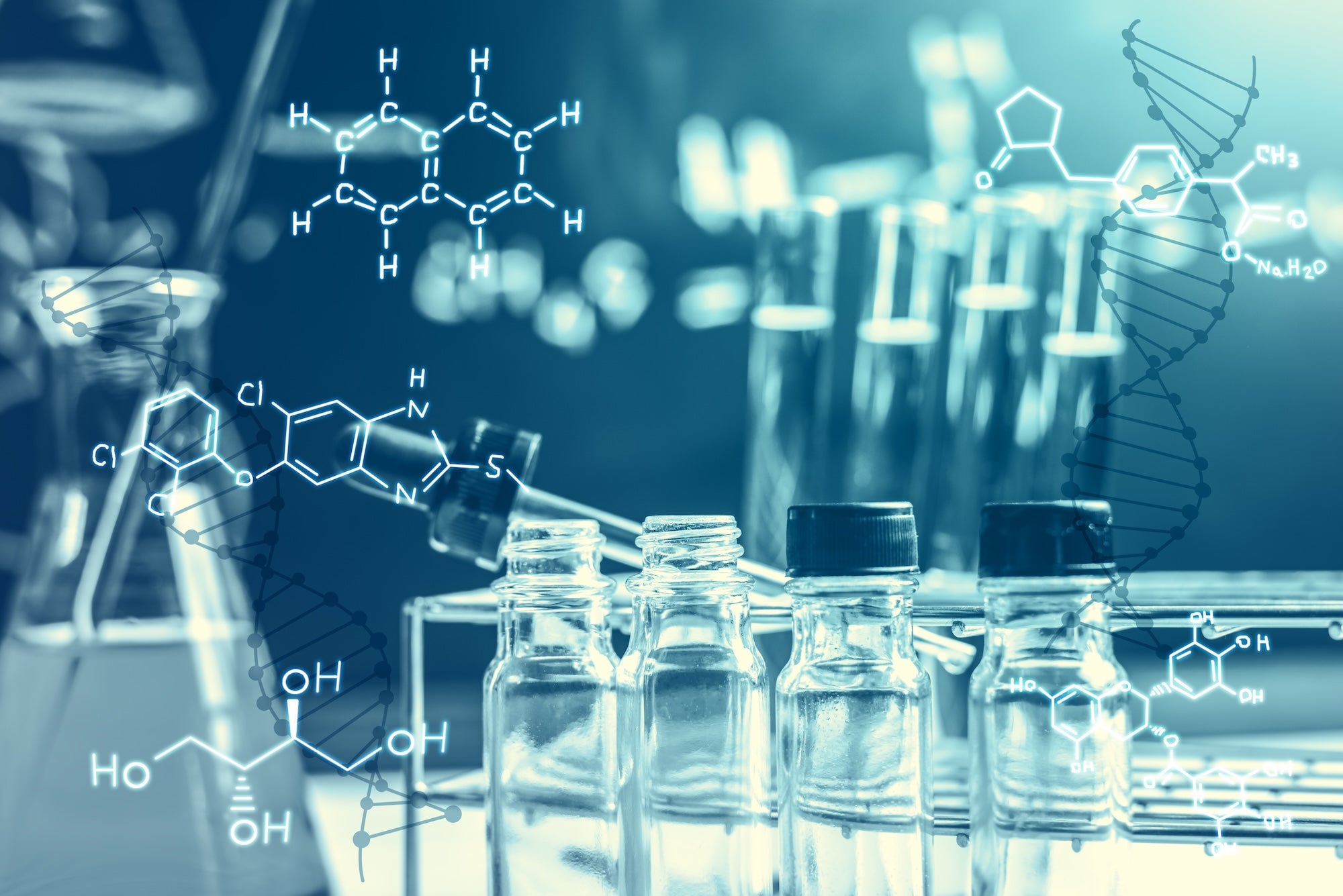 Laboratory glassware containing chemical liquid, science research, science background
