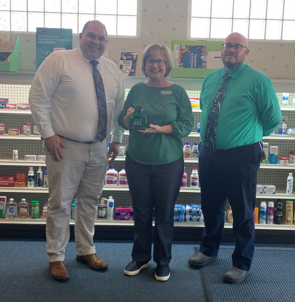 picture of nick adams and craig kimble with a student preceptor