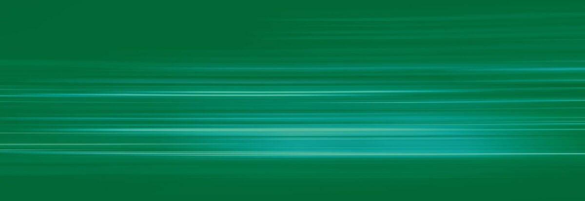 Abstract green light trails in the dark, motion blur effect