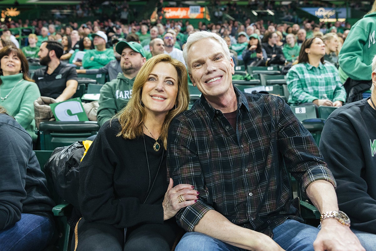 Alys and Brad D. Smith at a Marshall University Basketball game.