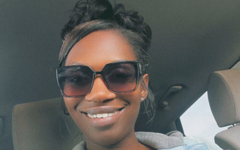 Nekesha Cabbell takes a selfie in her car