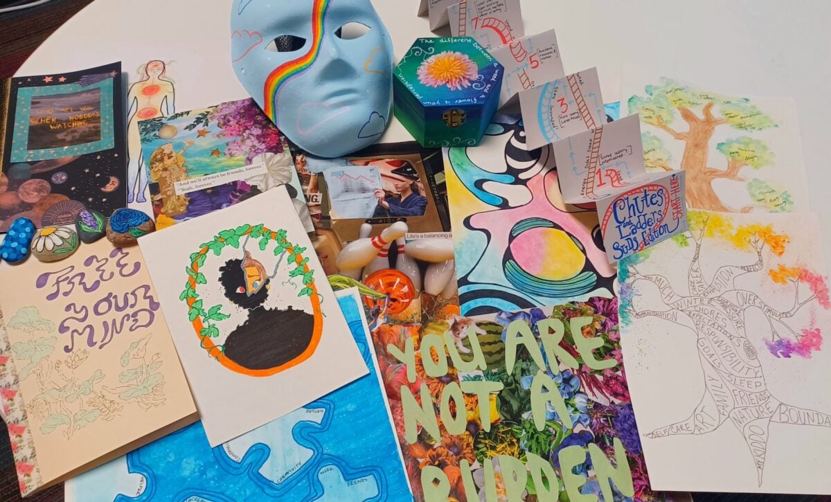 works of art laying on a table from With Flying Colors initiative
