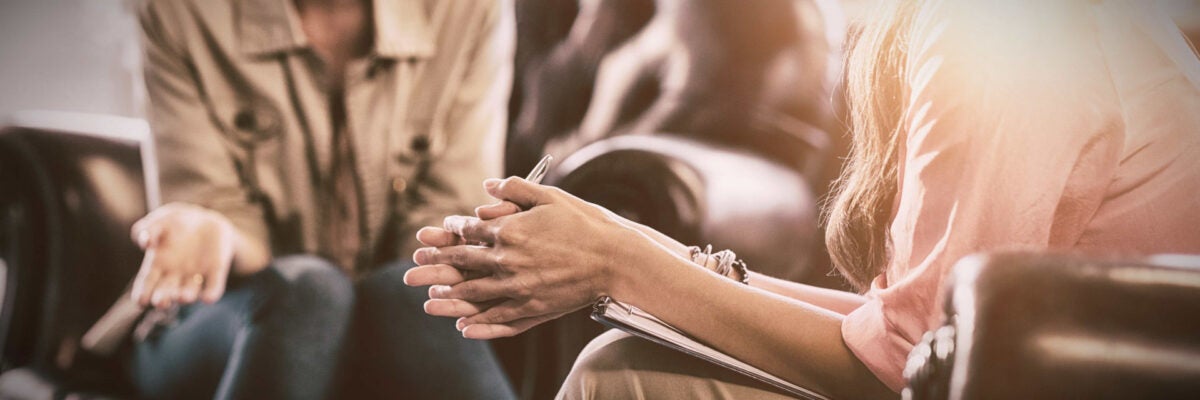 two people talking having a counseling session