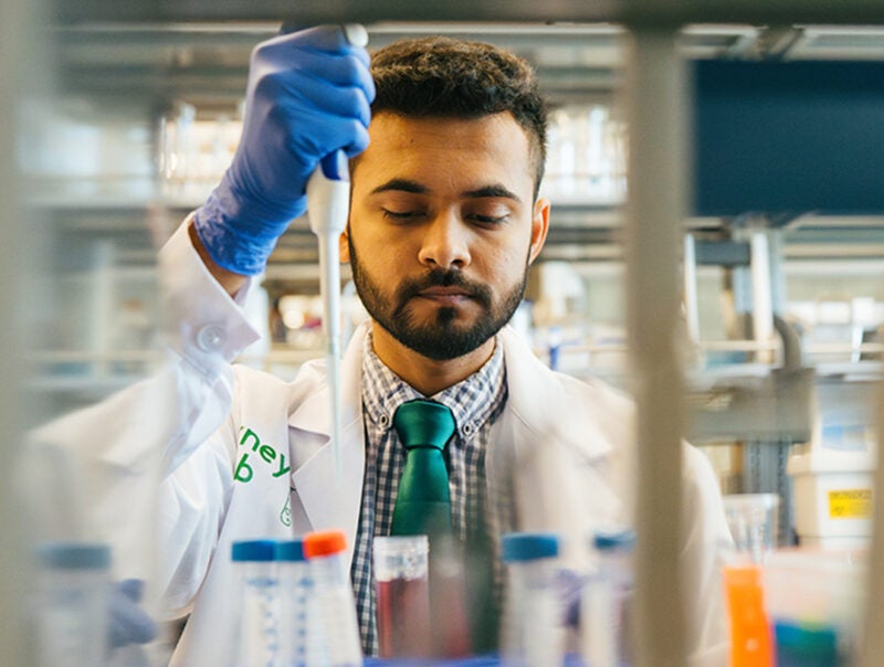 Marshall University student working in a lab
