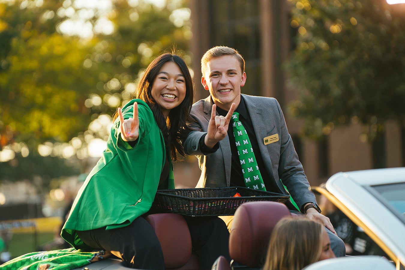 Students participate in Marshall University's annual homecoming parade