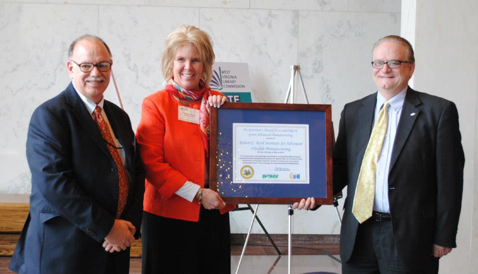 Photo of Charlotte Weber receiving award Photo of Charlotte Weber receiving award