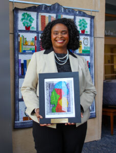 Cynthia Jones receiving her award