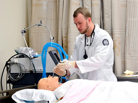 Medical student incubates mannequin
