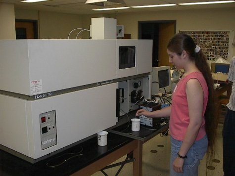 student working on a Varian Liberty 110 ICP-AES (1994)