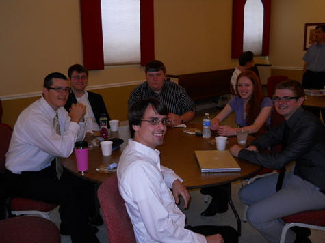 Members of the Kolling lab enjoying food and talking about science at the Final Research Symposium of the Summer Research Program.