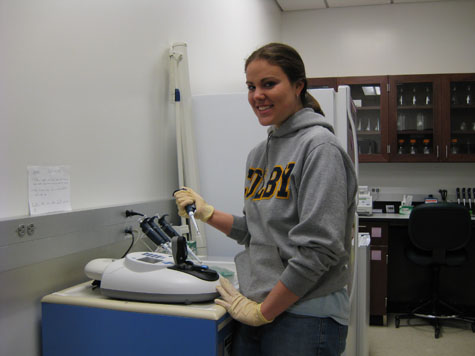 student working on a GE NanoVue UV/Vis Spectrophotometer (2008)