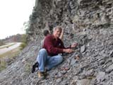 Photo from Sedimentation and Stratigraphy field trip showing students examining field of rocks