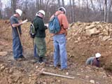 Photo from Sedimentation and Stratigraphy field trip showing students around an in-ground pipeline installation