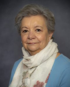 Headshot image of Dr. Maria Carmen Riddel