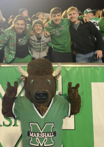 Marshall Students with Marco while cheering on Herd Football in Joan C. Edwards Stadium