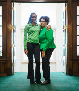 Cassandra and Kymora Woods smile together at Marshall University