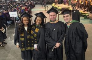 Ethan Starkey with classmates at Marshall University's Winter Commencement