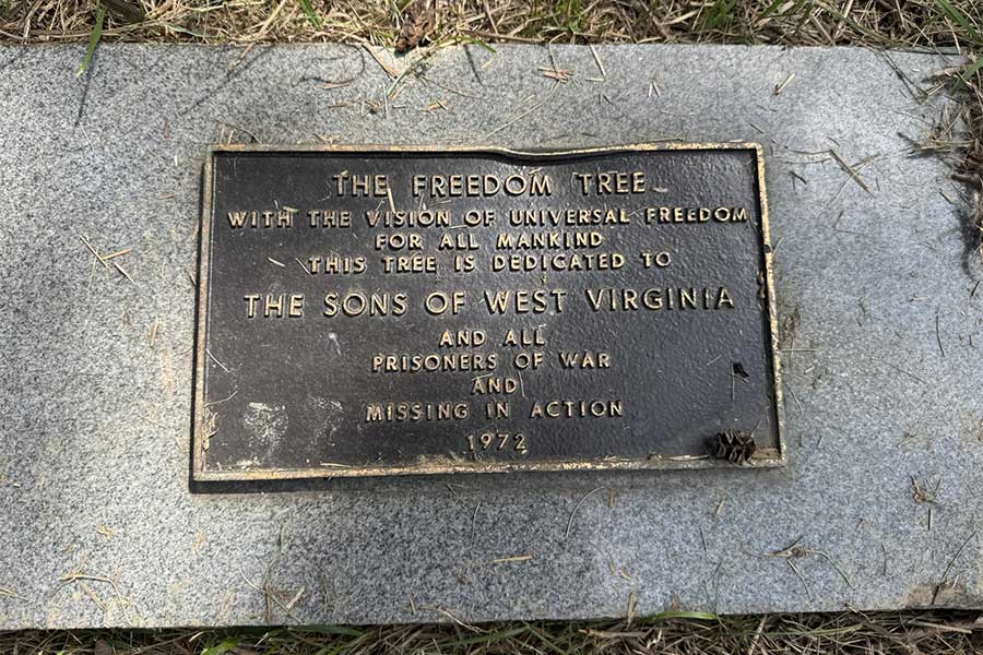 Commemorative marker for the West Freedom Tree, dedicated in 1972 to The Sons of West Virginia and all prisoners of war and missing in action.